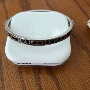 Coach silver with black enamel bangle bracelet.